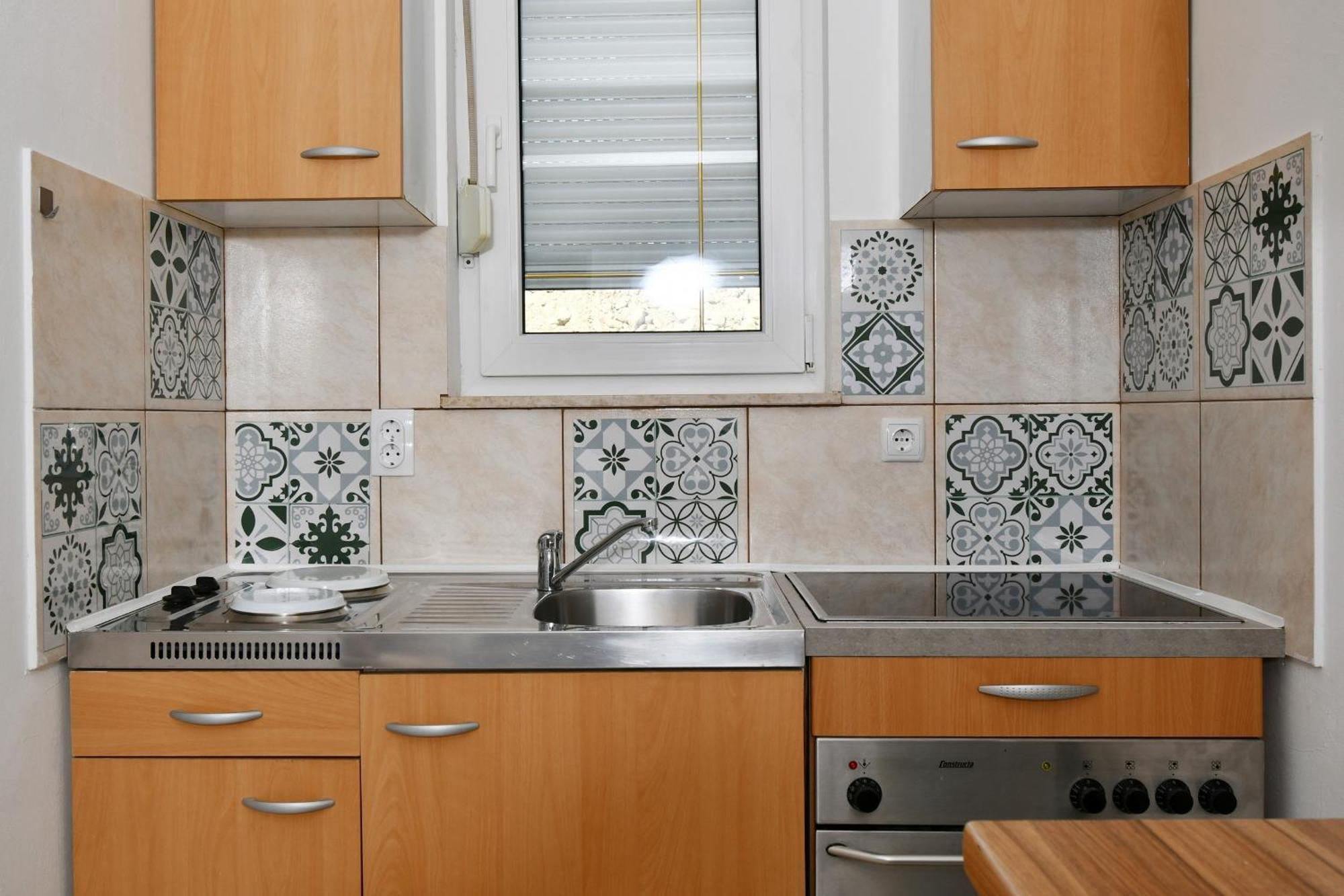 Apartments Novotny Banjol Екстер'єр фото